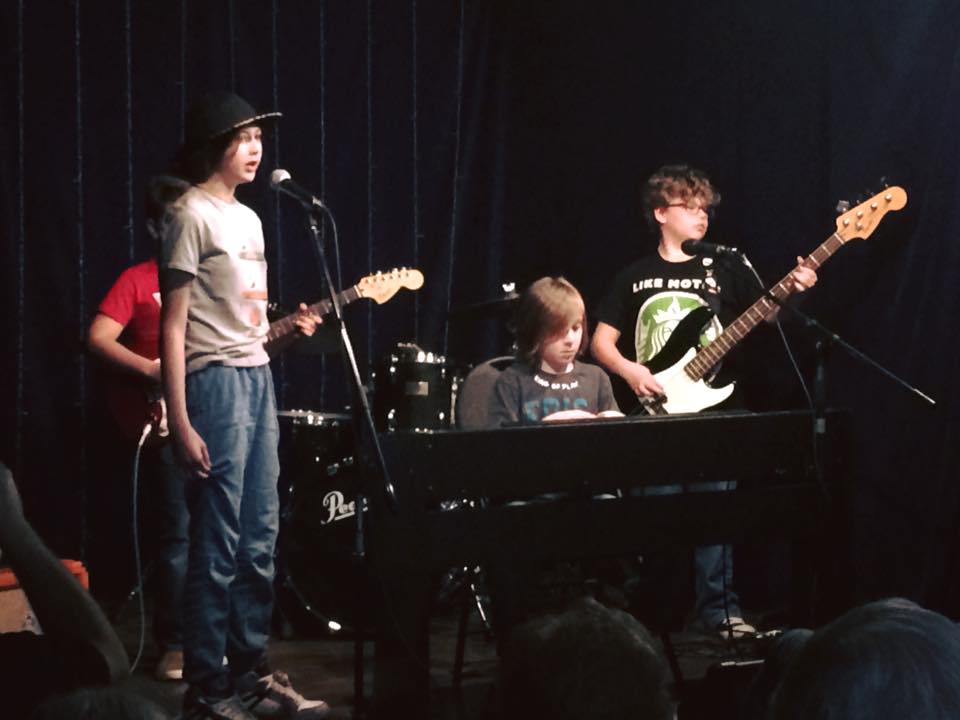 kids band performing on stage